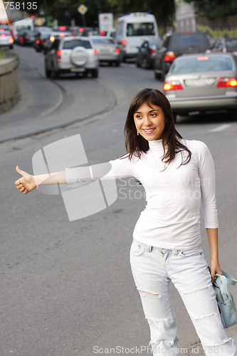 Image of Hitchhiking brunette