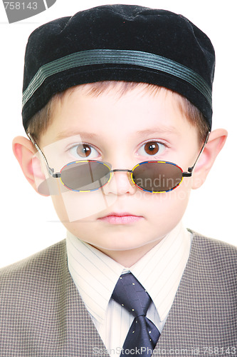 Image of Serious kid in sunglasses