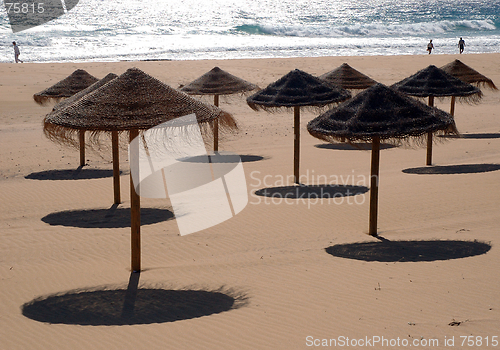 Image of sun hats in the beach