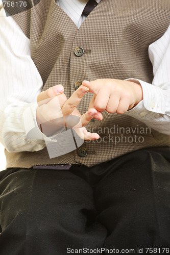 Image of Child hands at dactilonomy