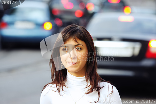 Image of Brunette and traffic