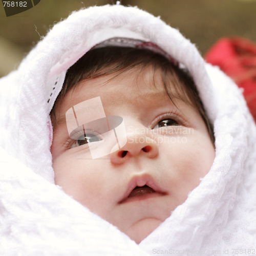 Image of Baby in coverlet