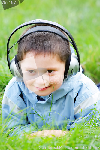 Image of Smiling kid in headphones