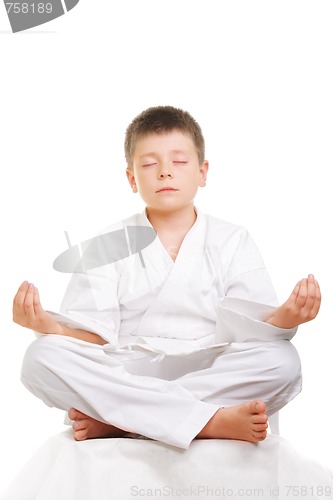 Image of Meditating karate boy