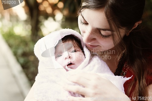 Image of Mother looking at child