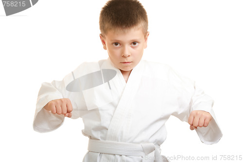 Image of Karate boy limbering up
