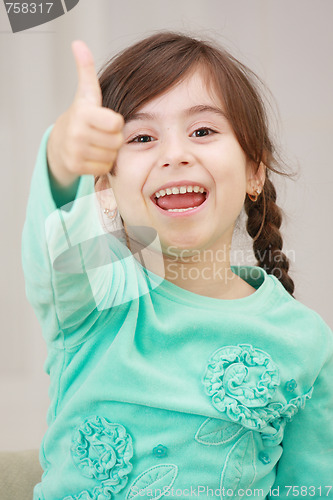 Image of Shouting girl with thumb up