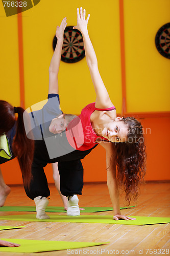 Image of Woman making aerobics in group