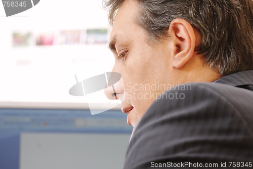 Image of Businessman at work sideview
