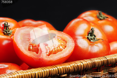 Image of Slit tomato in basket closeup