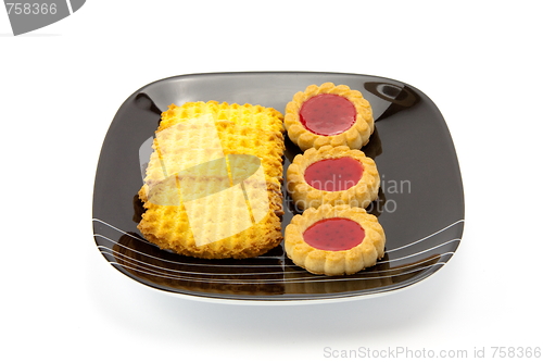 Image of cookies on plate isolated on white backgrounds