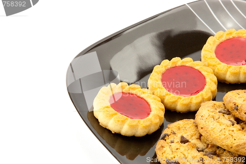 Image of cookies on plate isolated on white backgrounds