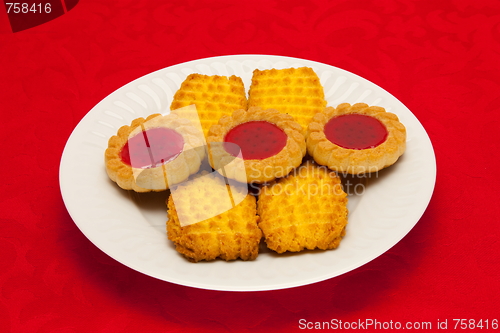 Image of plate of cookies on red background