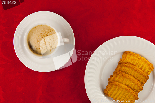 Image of Coffee and cookies on a red background