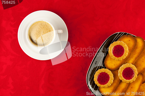 Image of Coffee and cookies on a red background