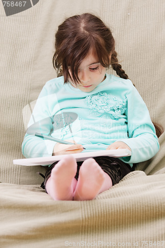 Image of Little girl drawing