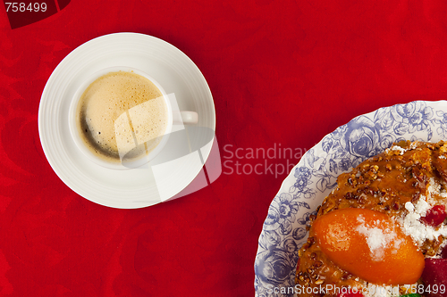 Image of white cup of coffee  on red background