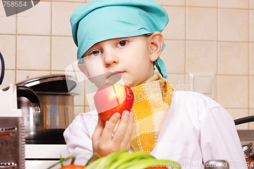 Image of Little cook with red apple