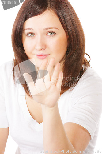 Image of Brunette gesturing stop