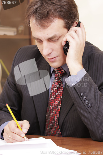 Image of Businessman at phone conversation