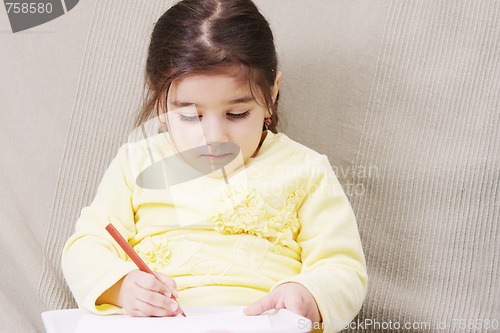 Image of Girl in yellow drawing