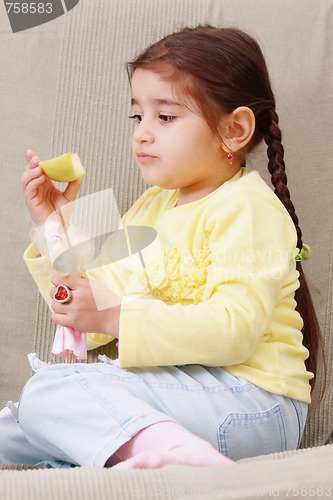 Image of Girl with apple slice