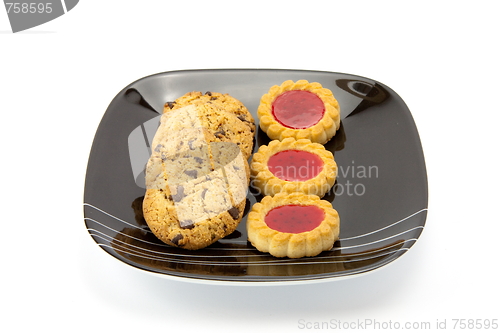 Image of cookies on plate isolated on white backgrounds