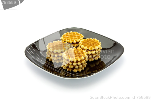 Image of cookies on plate isolated on white background