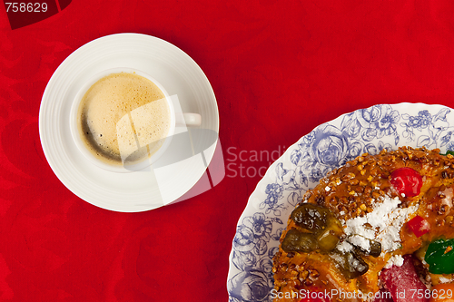 Image of white cup of coffee  on red background