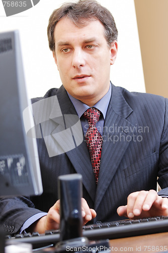 Image of Businessman typing