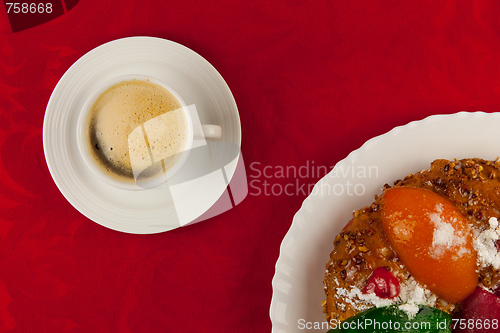 Image of white cup of coffee  on red background