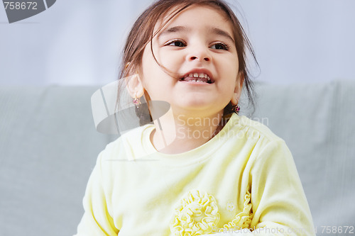 Image of Little girl in yellow