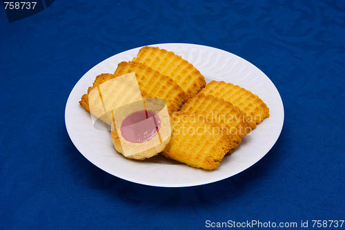 Image of cookies on a Plate on a blue background