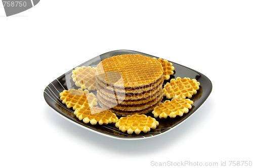 Image of cookies on plate isolated on white background