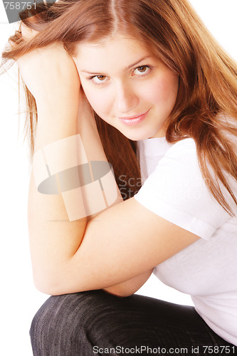 Image of Young brunette woman leaning on hands