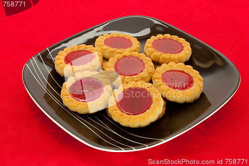 Image of plate of cookies on red background