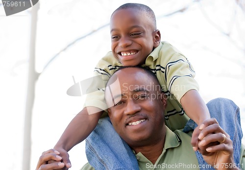 Image of African American Man and Child Having Fun