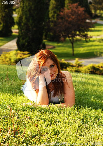 Image of Red haired beauty.