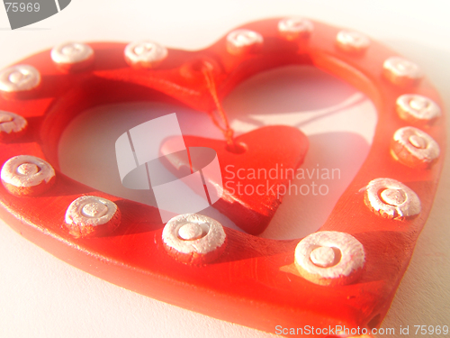 Image of Three valentine hearts background, toned