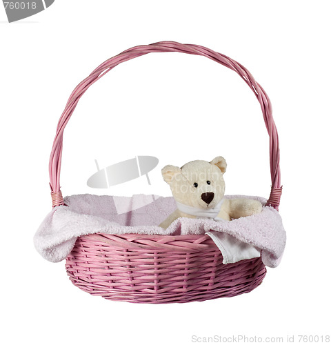 Image of Teddy bear in a pink basket