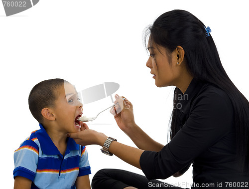 Image of mother feeding her son