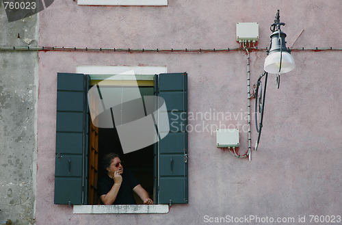 Image of Man in window