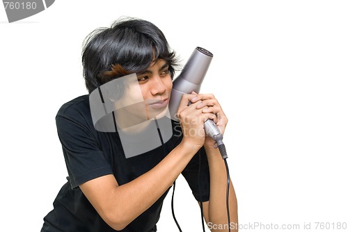 Image of Teenager attacking w hair drier