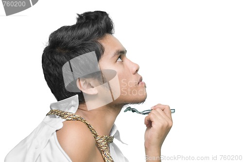 Image of Asian man shaving
