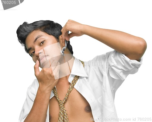 Image of Asian man shaving