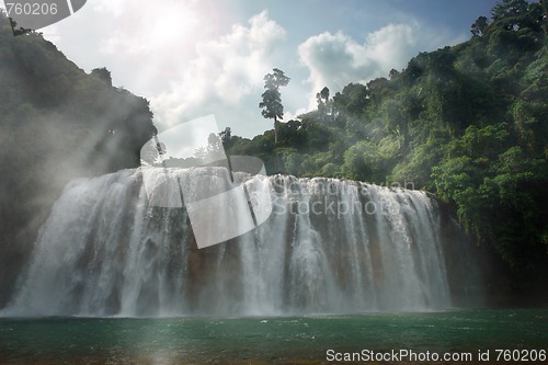 Image of Gloomy jungle waterfall