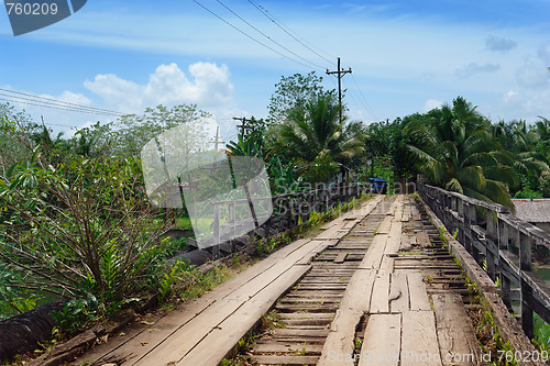 Image of Crumbling tropical bridge