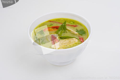 Image of green curry in a white bowl