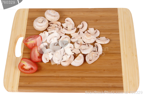 Image of mushrooms on chopping board 