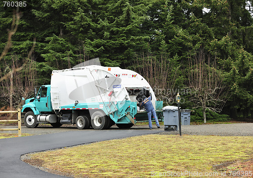 Image of Garbage Truck and Sanitation Worker